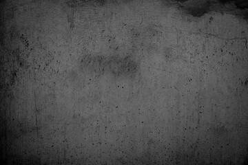 Black rough concrete wall texture background.