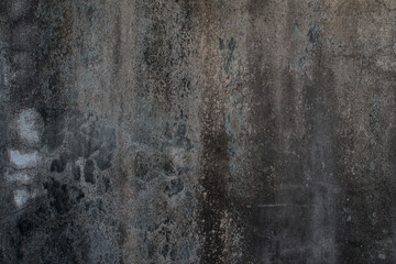Black rough concrete wall texture background.