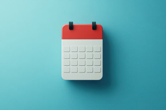 Red and white alarm clock on blue background.