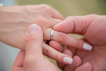 hands with wedding rings, wedding, rings, flowers
