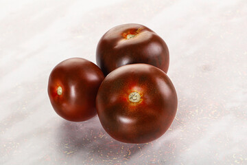 Organic natural juicy Kumato tomato