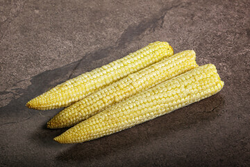 Raw sweet baby corn heap