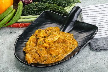 Spicy chicken masala in the bowl