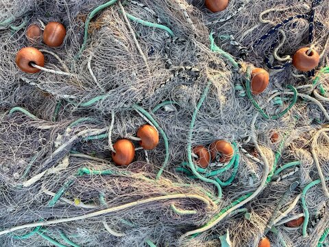 Full frame overhead view of a stack of fishing nets, Italy