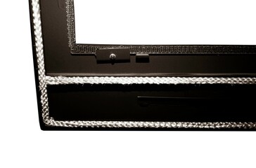Oven sealing tape on a fireplace door on a white background