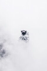 Astronaut in a foggy, ethereal environment