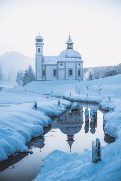 Seekirchl (Heiligkreuzkirchein) in rural winter landscape, Seefeld, Tyrol, Austria