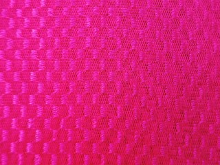 Close up of Red Fabric Texture Elastic with Seamless Fiber Pattern