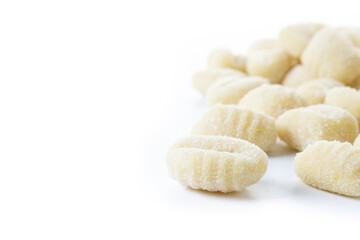 Tasty raw gnocchi isolated on white background. Copy space