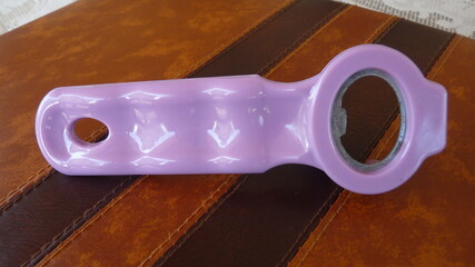 Pink Soda Bottle and Opener: A Burst of Sweetness and Simplicity, Symbolizing Refreshment,...