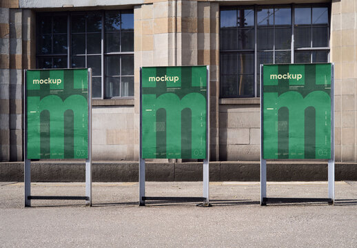 Mockup Of Three Vertical Customized Freestanding Posters