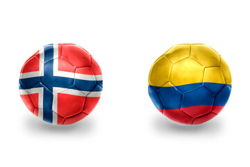 Obraz premium football balls with national flags of norway and colombia ,soccer teams. on the white background.