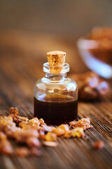 Myrrh essential oil in a bottle with myrrh resin