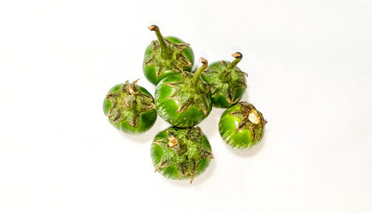 green eggplant vegetable white cloth background