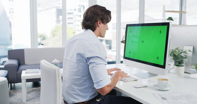 Business man, computer and green screen on monitor mockup in office with web designer and programmer. Desk, project and website development with digital research and software with tracking marker