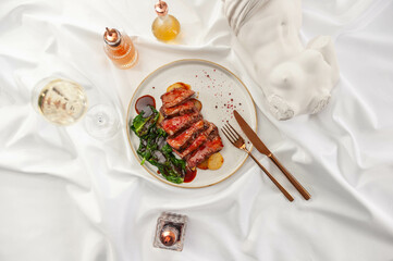 Beef Steak with Confit Potatoes and Spinach