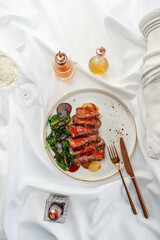 Beef Steak with Confit Potatoes and Spinach