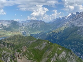 Fototapeta premium View of the Urner Alpen from the peaks above Lake Melchsee or Melch Lake in the Uri Alps mountain massif, Kerns - Canton of Obwald, Switzerland (Kanton Obwalden, Schweiz)