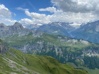 Fototapeta premium View of the Urner Alpen from the peaks above Lake Melchsee or Melch Lake in the Uri Alps mountain massif, Kerns - Canton of Obwald, Switzerland (Kanton Obwalden, Schweiz)