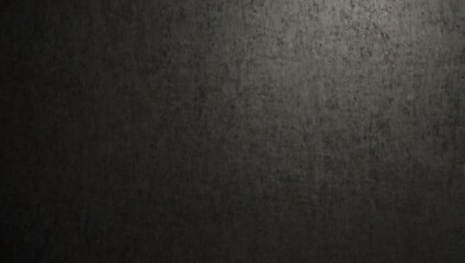 black background , A dark gray, textured surface. Slight variations in shading.