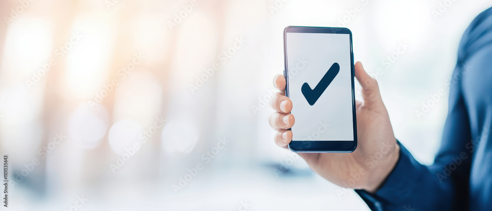 Aufkleber close up of smartphone screen displaying checkmark symbol, indicating approval or confirmation. imag