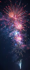 Fototapeta premium New Year's Eve fireworks exploding in the night sky, festive, fireworks display