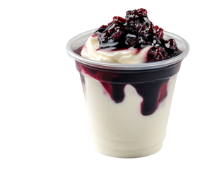 a cup of dessert with a sauce on top