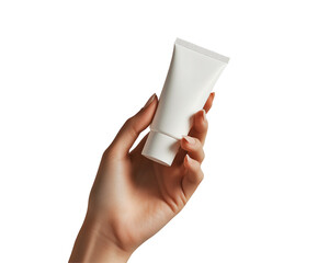 a hand holding a white tube