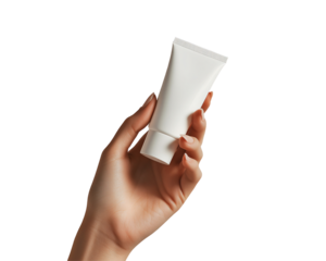 a hand holding a white tube