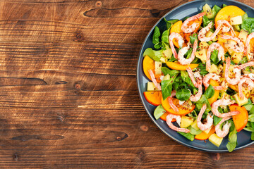 Shrimp salad with persimmon.