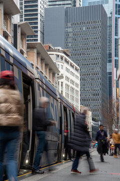 Passengers alighting tram in the city
