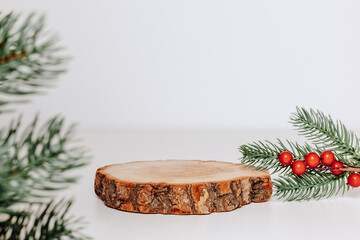 Christmas and winter podium, empty wooden showcase with christmas fir tree for design and product...