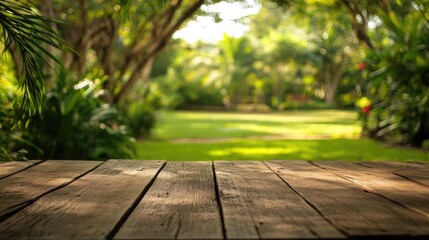 Wooden tabletop in the forefront framed by a gently blurred lush green garden, showcasing vibrant foliage and serene natural light.