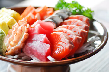 sashimi or raw salmon , Akami and raw tuna or raw mackerel and kanikamaand wasabi or raw fish