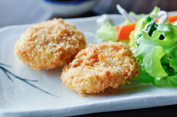 shrimp cakes or fried shrimp balls , deep fried shrimp balls