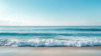 Serene Seaside Scene Featuring Gentle Blue Waves Lapping Against a Sandy Shore Under a Clear Bright Sky