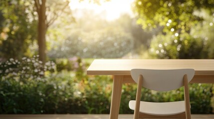 Fototapeta premium Wooden table accompanied by a minimalist white chair, overlooking a blurred garden scene illuminated by soft natural light.