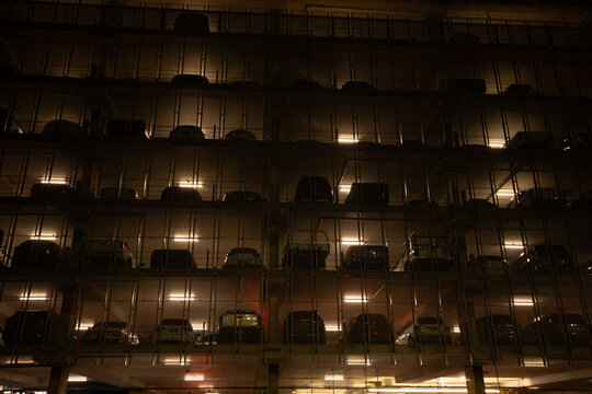 Multi story car park at the Sydney Domestic Airport illuminated at night