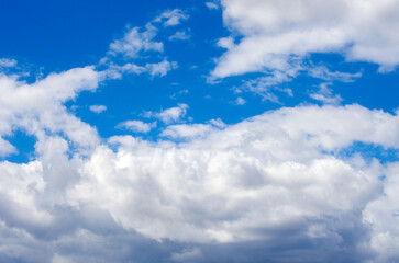 Naklejka premium White clouds in blue sky