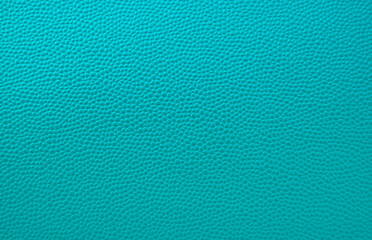 Teal color pebbled leather texture as background