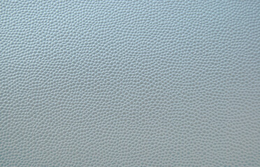 Gray color pebbled leather texture as background