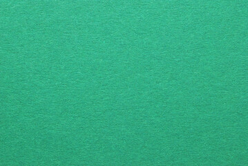 A sheet of green color cardboard texture as background	