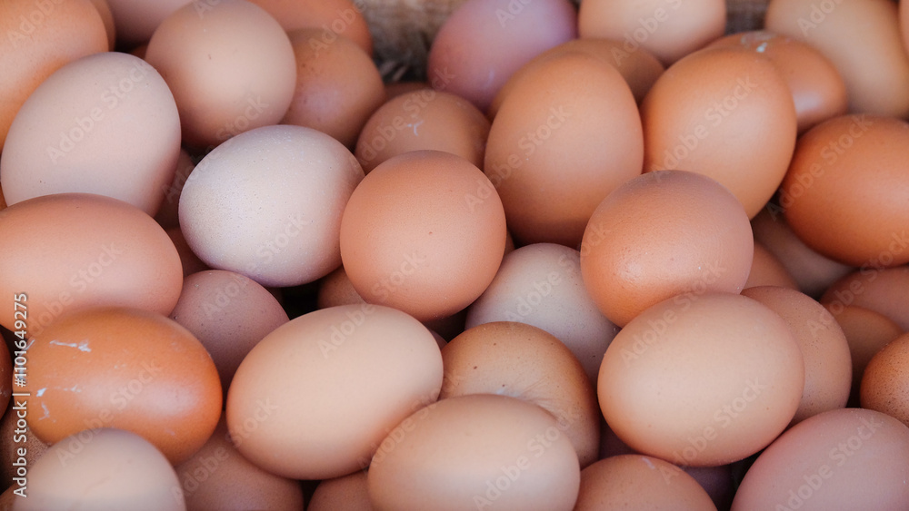 Poster pile of chicken eggs with abstract patterns and textures. eggs on the shop floor. eggs look dirty. f