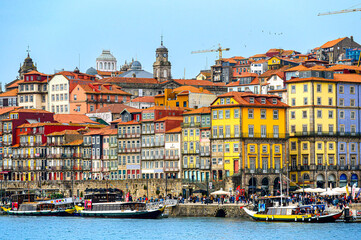 Porto, Portugal, Traditional rabelo boat on the waters of the Douro River, with t