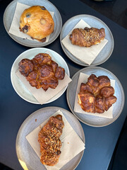 assorted freshly baked pastries served at traditional denmark bakery cafe shop.