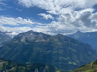 Beautiful photogenic clouds over the Uri Alps massif in the Swiss Alps, Melchtal - Canton of Obwald, Switzerland (Kanton Obwalden, Schweiz)