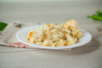 Diet boiled cauliflower fried in oil with spices