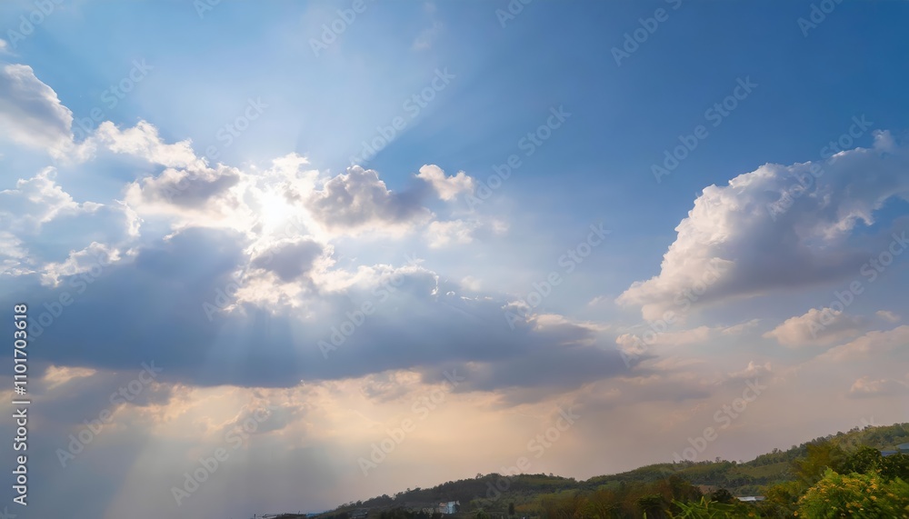 Poster a serene sky illuminated by sunlight, painted in shades of blue, scattered with small and large clou