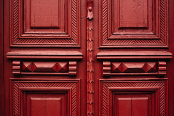 antique wooden carved burgundy doors