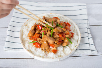 Top view of Kung Pao Chicken in a bowl